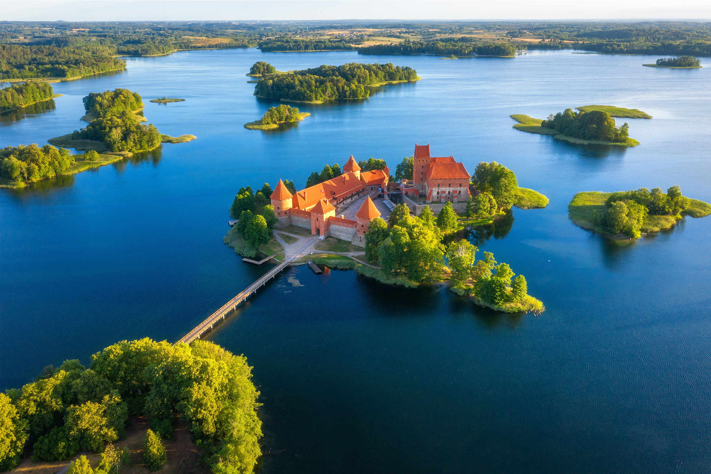 Trakai castle in Lithuania aerial view. Green islands in lake in Trakai near Vilnius.