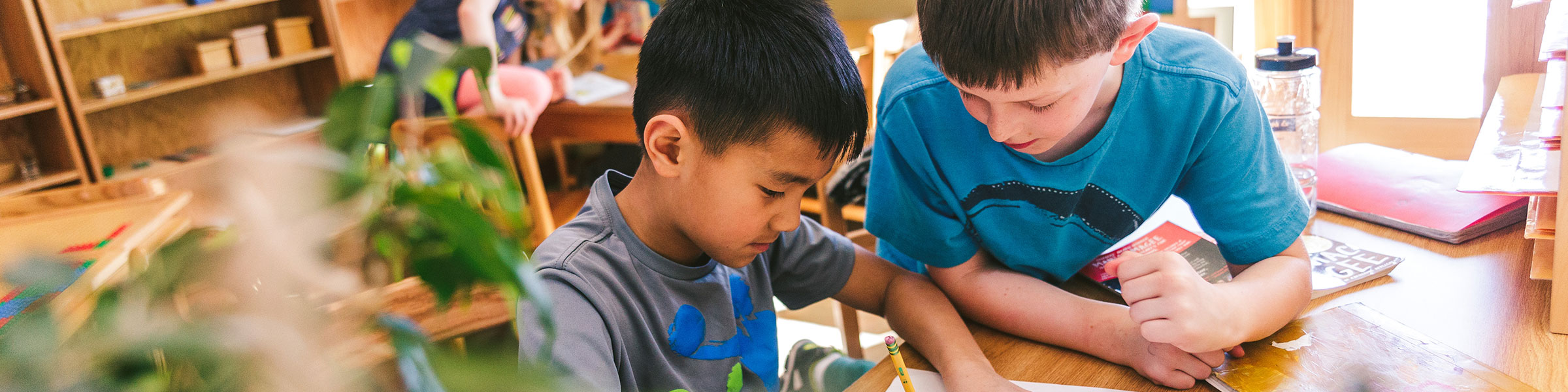 Boys working together in classroom