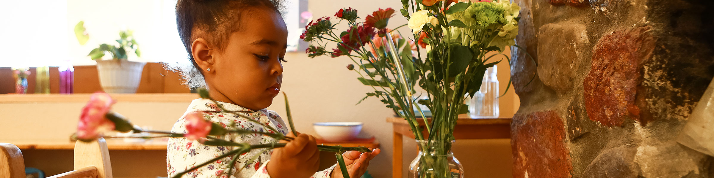 Child arranging flowers