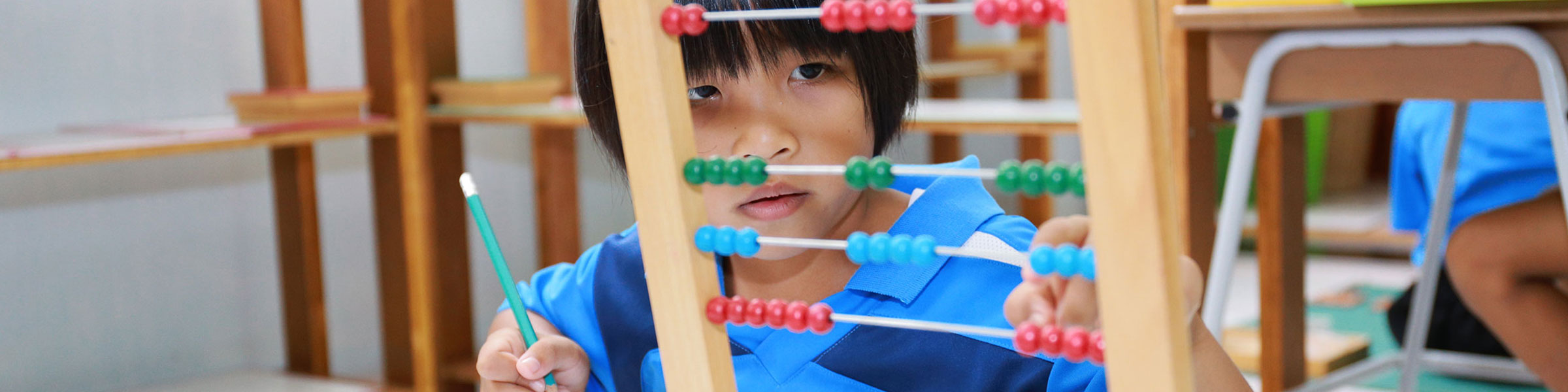 Child with abacus