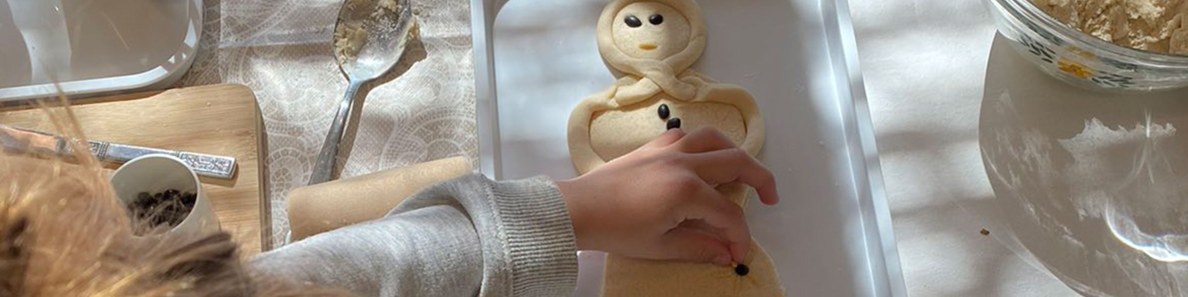 Child with cookie dough