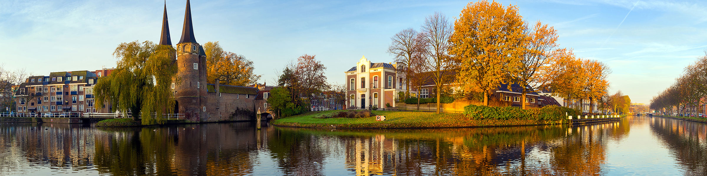 View of the Delftse Schie Canal and the Eastern Gate (Oostpoort), Delft, The Netherlands.