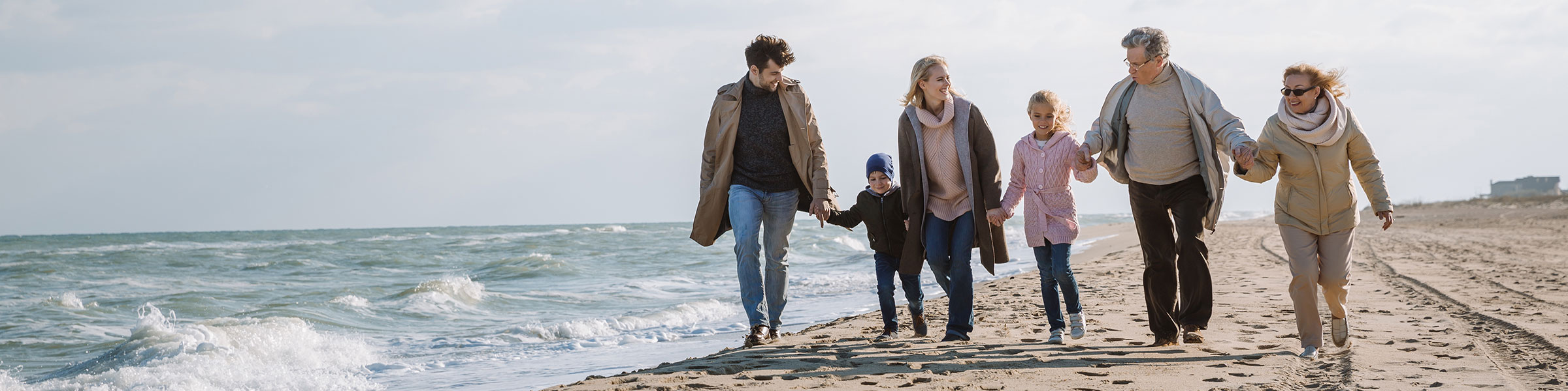 Family walking on beach