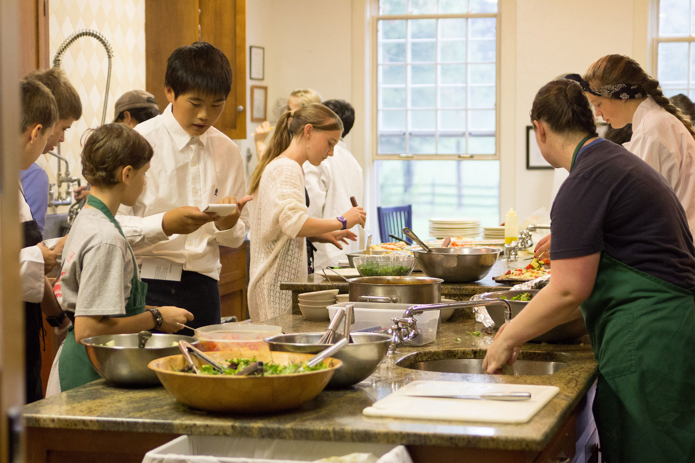 Adolescents working in a catering environment
