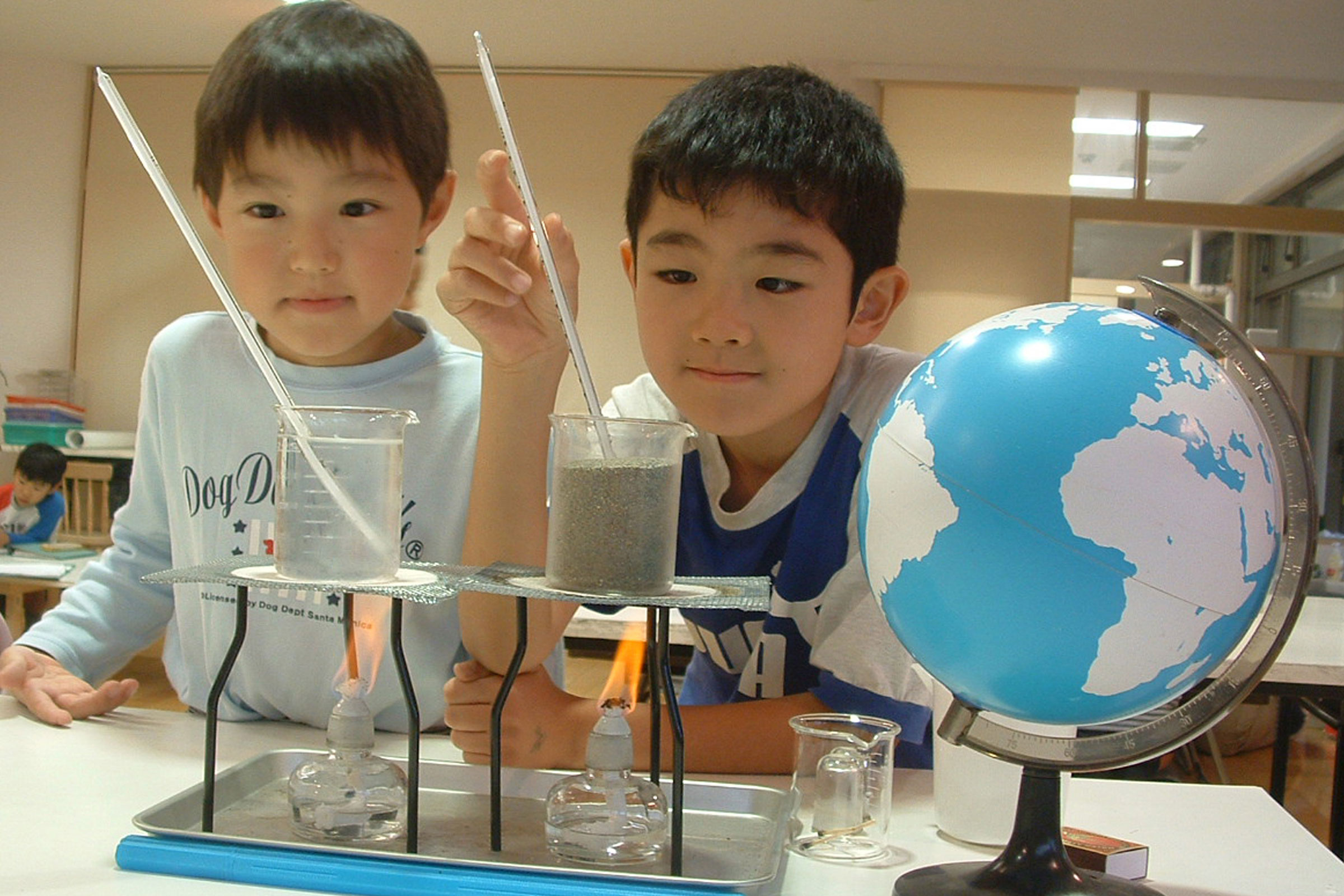 Children performing Montessori science experiment