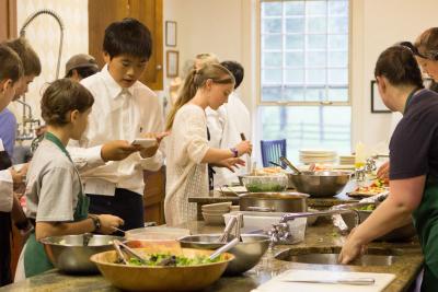 Montessori adolescents in kitchen
